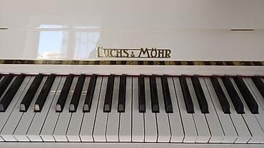 Музыкальные инструменты: Ağ rəngli akustik piano – upright (şaquli) modellə Xüsusiyyətlər: - — 6