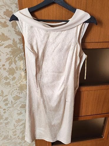 İki defe geyinilmiş Qadın geyimi – krem rəngli, parıltılı