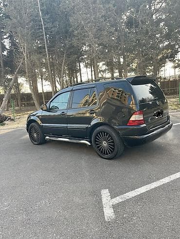 Mercedes-Benz ML 320: 3.2 l | 2000 il Ofrouder/SUV