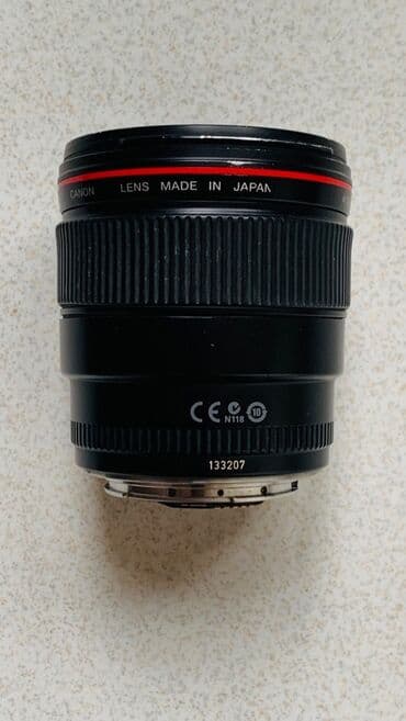 printer satisi islenmis: Canon EF 35mm f/1.4 L USM
Tam ishlek veziyetde, ciziqlari var — 7