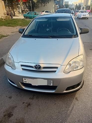 Toyota Corolla hatchback (E120). Gümüşü rəng, 5 qapı, 5 nəfərlik — 1