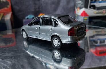 metbex tavan modelleri: Коллекционная модель Lada Kalina VAZ1118 silver 2004 Welly Scale — 12