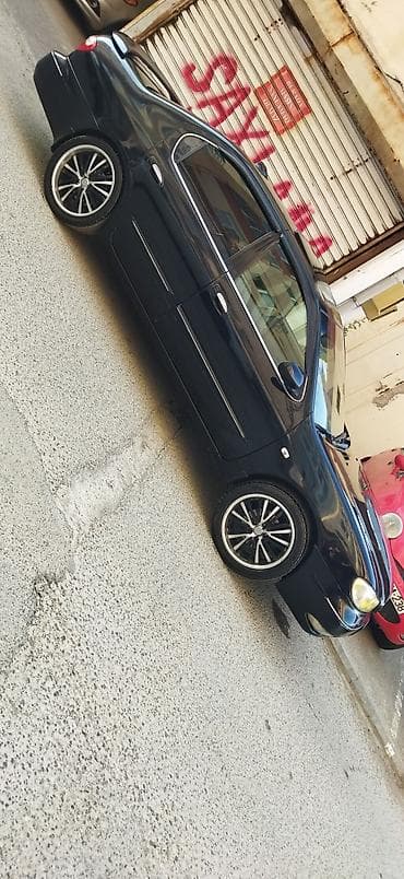 Avtomobil satışı: Model: Jaguar S-Type sedan Rəng: qara Kuzov: sedan, 4 qapı Disklər — 1