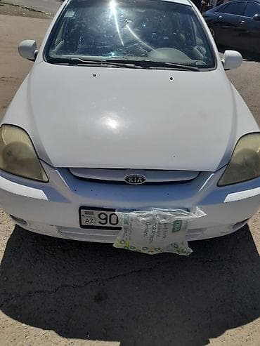 Kia Rio: 1.5 л | 2004 г. Универсал