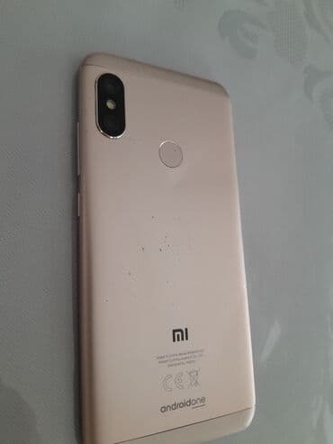 mi 8 lite qiymeti: Xiaomi Mi2A, 32 GB, rəng - Qızılı, 
 Sensor, Barmaq izi, İki sim kartlı — 8