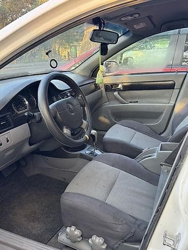 opel tigra 2005: Chevrolet Lacetti: 1.8 l | 2008 il 250000 km Sedan — 6