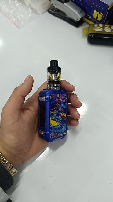 şəxsi esyalar: Rəngli dizaynlı elektron siqaret (vape) cihazı - Kompakt bədən və — 1