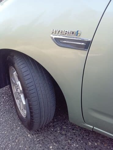 şüşə silən matoru: Toyota Prius Hybrid – liftbek - Yanacaq sistemi: hibrid (benzin + — 2