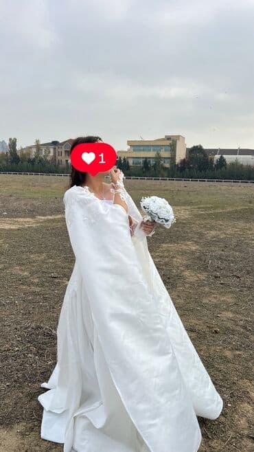 Ağ gəlinlik – pelerinli model - Klassik ağ rəng, atlas/parıldayan lalafo.az -da Ağ gəlinlik – pelerinli model - Klassik ağ rəng, atlas/parıldayan