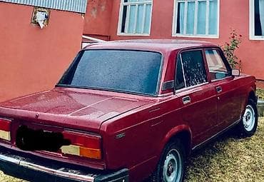 2107 faralari: VAZ 2107 sedan - Kuzov: bordovı rəng, 4 qapı, klassik xətləri ilə — 2