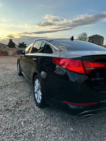 traktor altlıqlı qara qadın bosonojkaları: Kia Optima: 2.4 l | 2013 il Sedan — 13