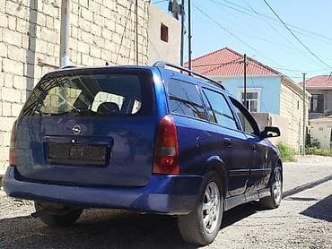 daewoo gentra 2010: Opel Astra: 1.6 l | 2003 il Van/Minivan — 2