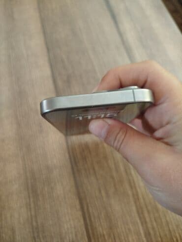 телефон fly fs457 nimbus 15: IPhone 15 Pro, Natural Titanium, Face ID — 1