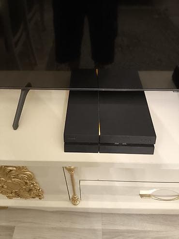 Sony PlayStation 4 (PS4) 1Tb yaddaş oyun konsolu dəsti ev