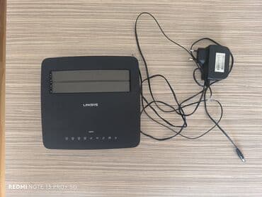 linksys by cisco: Modem
Linksys Wi-Fi 6 — 2