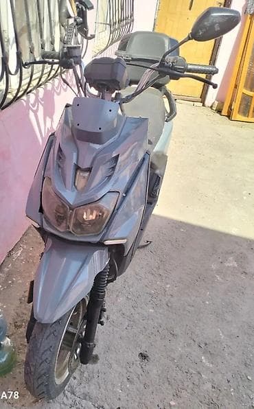 teziq olcen aparat: Skuter/skutermoped – şəhər daxili rahat hərəkət üçün praktik model — 2