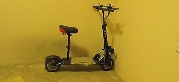 samokat elektrikli: Güclü elektrikli skuter – oturacaqlı, amortizatorlu, iri təkərli — 1