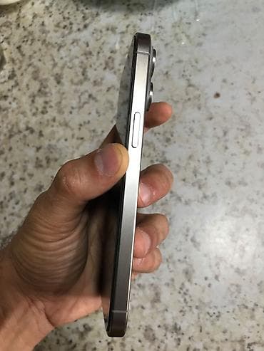 apple macbook: IPhone 15 Pro Max, 256 GB, Natural Titanium — 5