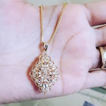 italyan qizili: Dəstə daxildir: Sep, Kulon, Sarı qızıl, 585 Əyar, 502 g — 2