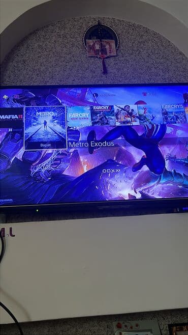 playstion 4: Playstation 4 slim ideal vəziyətdə plombu açılmıyıb dolu oyunla ps5 — 1