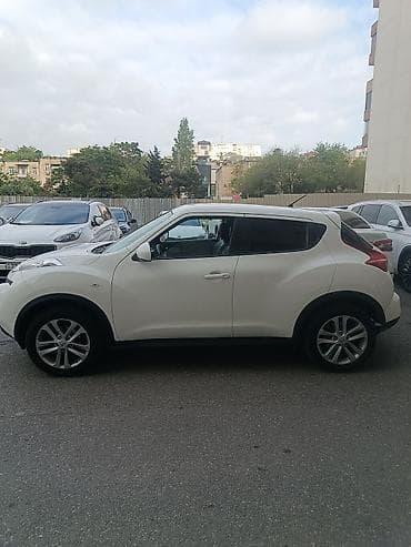 07 satisi: Nissan Juke, ağ rəng, Yapon krossoveri. Kompakt ölçülərə baxmayaraq — 3