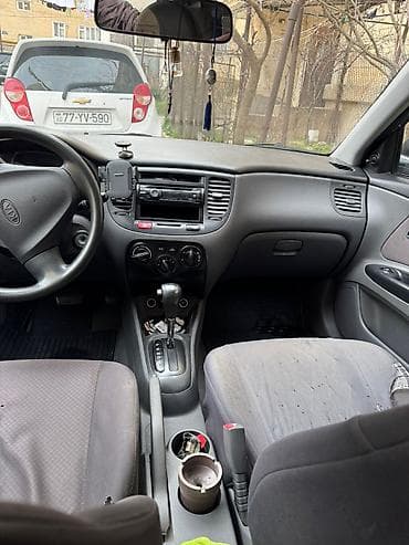 kia rio masin: Kia Rio: 1.4 l | 2010 il Sedan — 10