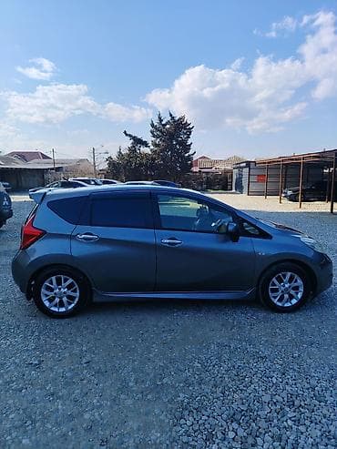 07 ucuz: Nissan Note Medalist (JDM), boz rəng, hatchback gövdə. Texniki — 7