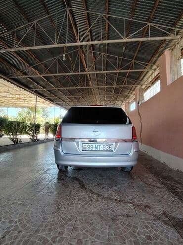 disk təkər type 0: Opel Astra H hatchback – gümüş rəng. Əsas xüsusiyyətlər: 2006 furqon — 6