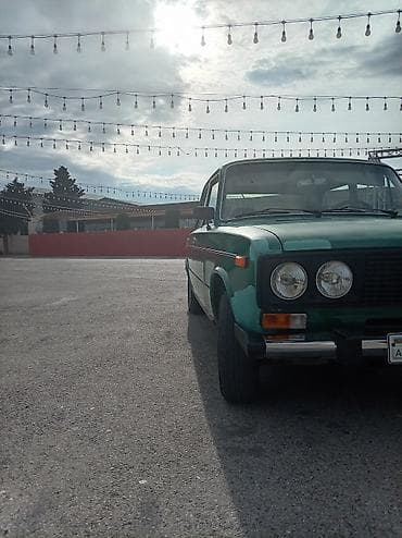 vaz 2106 stoplari: VAZ 2106, yaşıl rəng, sedan kuzov. Xüsusiyyətlər:mator 03. Karobka 5 — 2