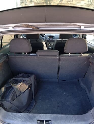 avtomat sürət qutusu: Opel Astra H hatchback - Kuzov: 5 qapılı hatchback, gümüşü rəng - — 4