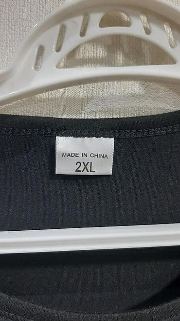kişi geyimi: Qara qadın T‑şörtü – üzərində “Does this shirt make me look pregnant?” — 3