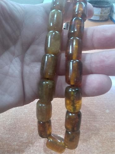 - Məhsul: Təsbeh - Material: Yarı şəffaf, bal-qaranlıq tonlarda
