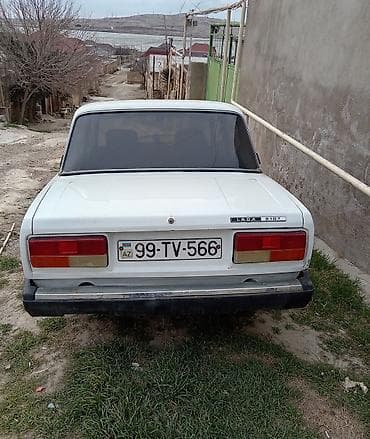 zil 5301 satilir: LADA 2107, ağ rəng, sedan. Texniki xüsusiyyətlər: - Benzin mühərriki — 4