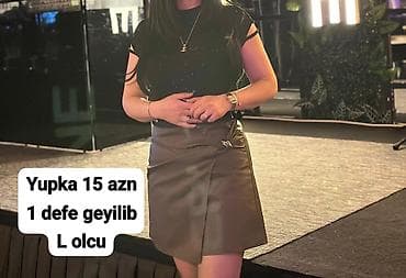 Ətəklər: Yubka – L ölçü. • Rəng: tünd boz. • Model: sarma (wrap) kəsimli, yan — 1