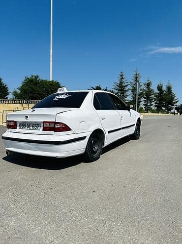 toy guzgusu: Saipa Saba (sedan) – ağ rəngdə, 4 qapılı, 5 yerlik şəhər sedanı — 5