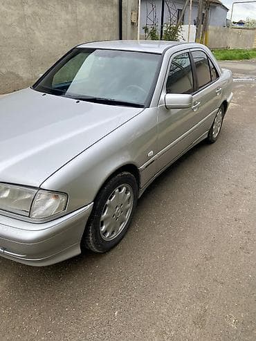 07 sekilleri cekmek: Mercedes-Benz C-Sinif sedan (W202), gümüşü rəng. - Kuzov: 4 qapılı — 6