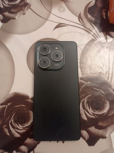 Məhsul: Smartfon (ön hissədə “dinamik ada” tipli ön kamera sahəsi