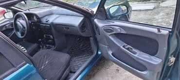 maşın al: Daewoo Espero sedan - Kuzov: sedan, tünd yaşıl rəng - Ön və arxa işıq — 11