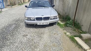 kreditle avtomobillerin satisi: BMW 7 Series sedan (E38) – gümüşü rəngdə, 4 qapılı, arxa ötürücülü — 6