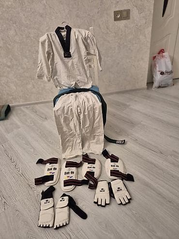 Комплекты одежды: Taekvondo dəstləri – tam komplekt Məhsul təsviri: - Dobok: ağ rəngdə — 1