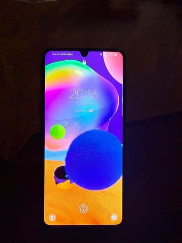 Apple iPhone: Samsung Galaxy A31, цвет - Голубой, Отпечаток пальца — 9