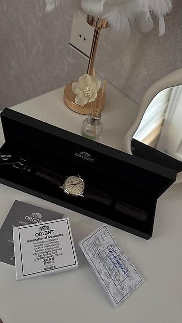 106 saat: Qol saatı, Orient, rəng - Qəhvəyi — 4