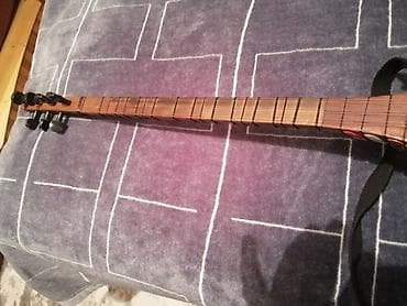 elektrik gitara: Elektrikləşdirilmiş saz – fərdi yığımdır - Korpus: tam ağac (tünd — 2