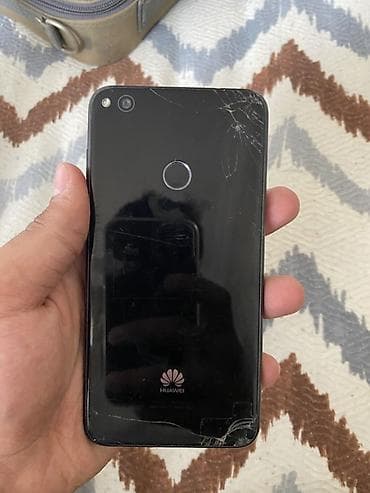 philips xenium 9@9s: Huawei P8 Lite 2017, 16 GB, rəng - Qara, Qırıq, Barmaq izi, Sensor — 5