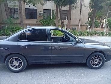 lider disk: Hyundai Elantra: 2 l | 2003 il Sedan — 5