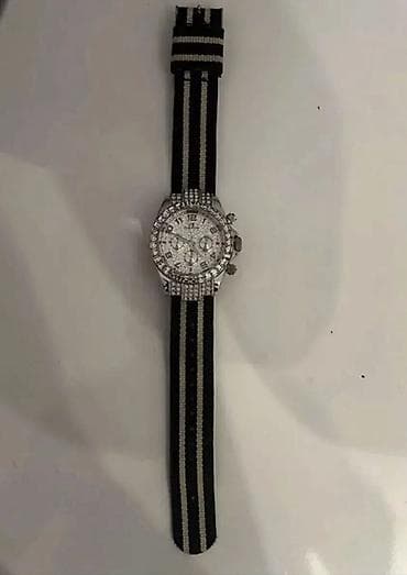 kəməri: Parlaq daşlarla işlənmiş qol saatı - Korpus: gümüşü rəngdə, daşlarla — 1