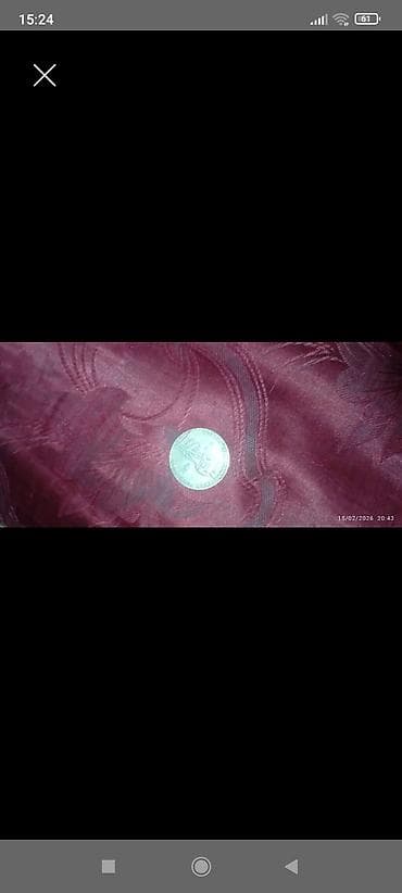 Kolleksiya üçün xatirə sikkəsi - Metal: gümüş rəngli ərintidən