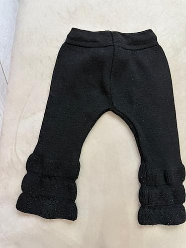 ag cins: Ağ rəngdə, elastik belə malik uşaq şalvarı. Diz nahiyələrində sevimli — 4