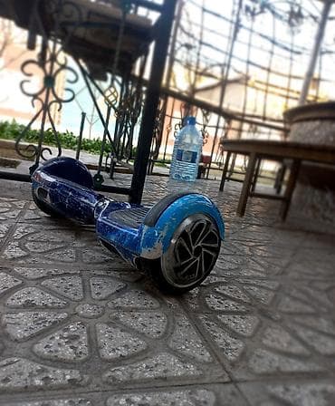 Elektrik nəqliyyatı: Öz-özünü tarazlayan iki təkərli hoverboard adaptr sutka yernde czq — 1