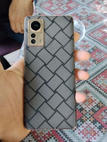 xiaomi redmi note 9 's: Xiaomi 12 — 1